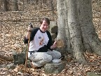 At the base of a majestic American Beech tree, Tim finds the next waypoint.