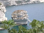 A tour boat cruises past the hunk of rock estimated to have broken off some 800 years ago.