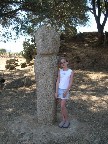 Standing next to one of the many menhirs found at the Filitosa site.