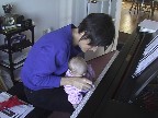 Showing Isabel the piano